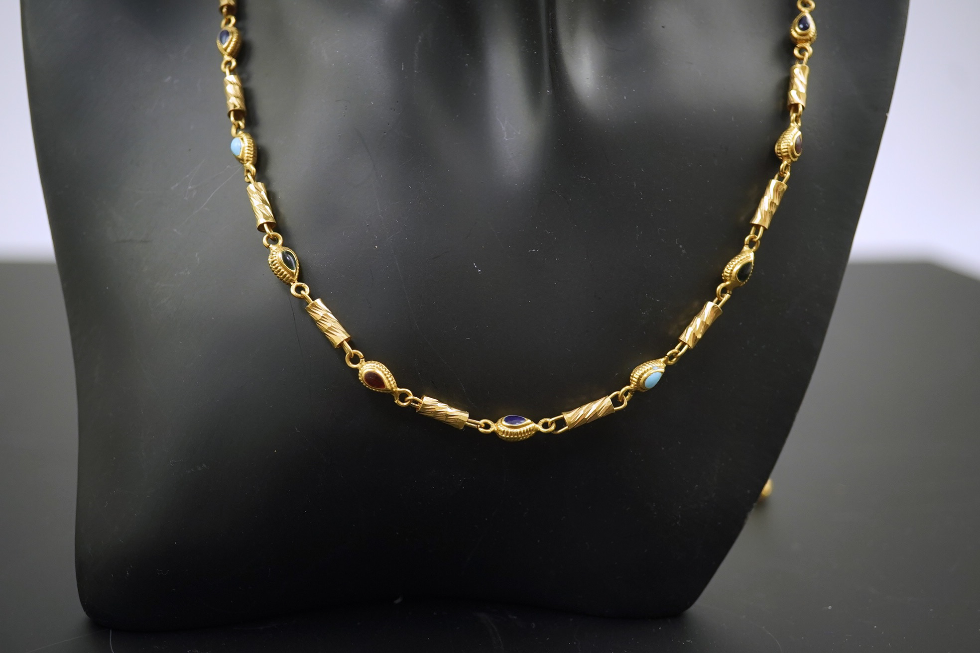 A modern Middle Eastern gold and polychrome enamel set necklace